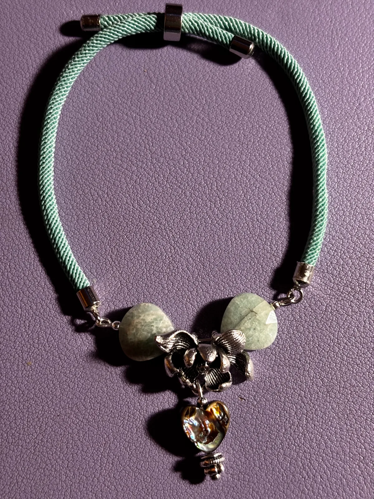 Mint green cord bracelet with stone and heart charm by Patty