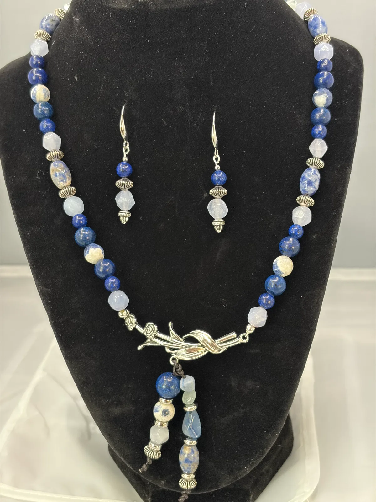 Blue and white knotted bead necklace and earring set by Patty