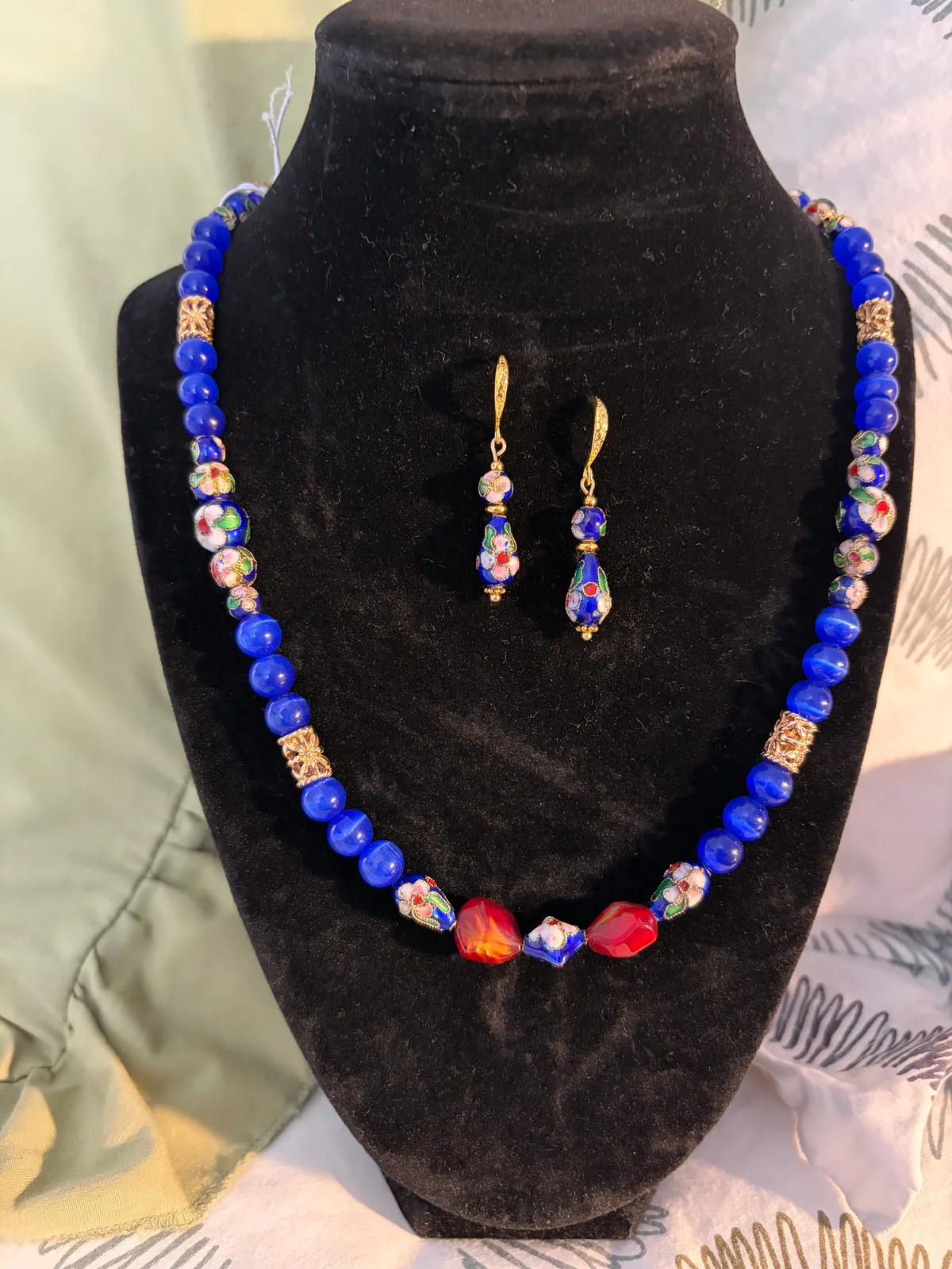 Blue cloisonné necklace and earring set handcrafted by Patty