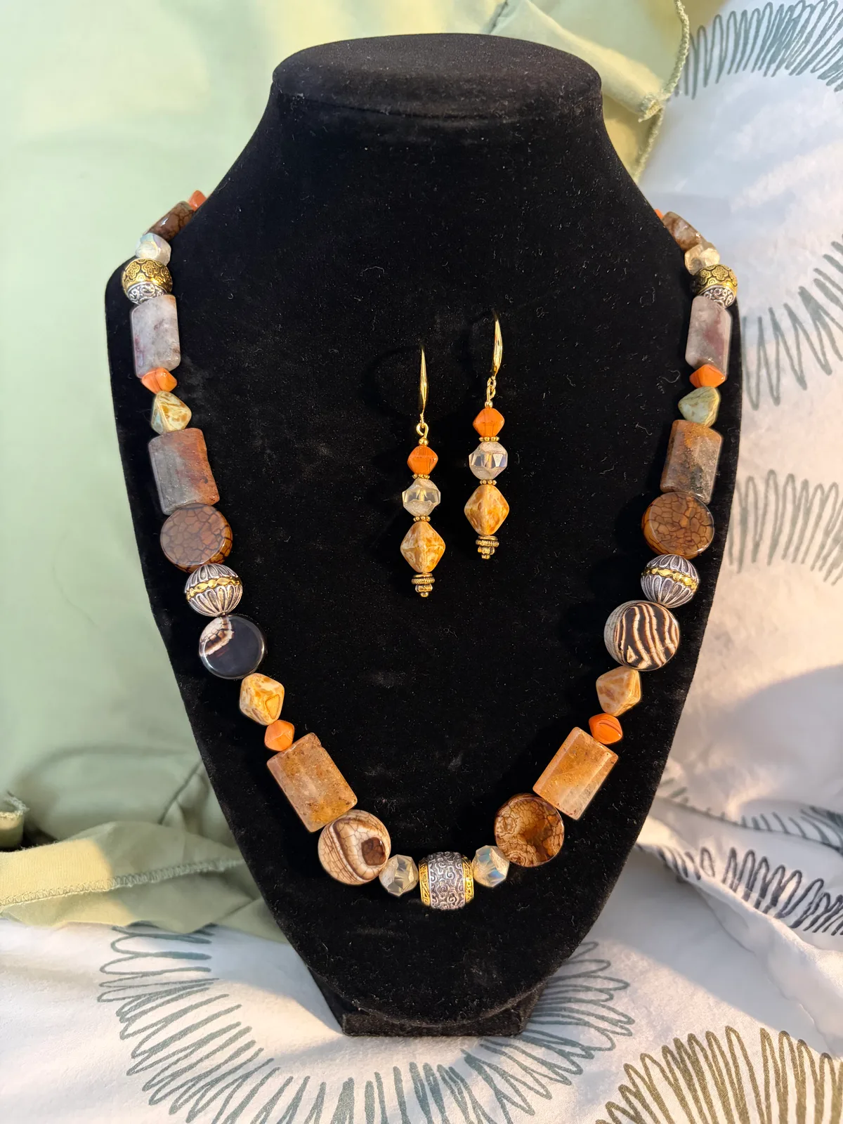 Earth tone necklace and earring set handcrafted by Patty