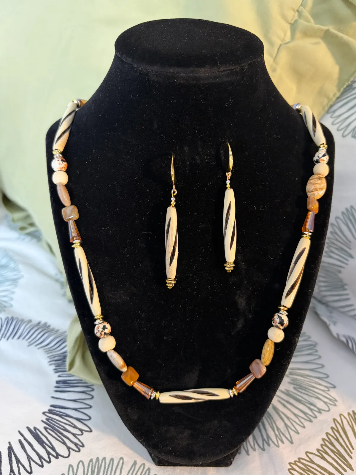 Ivory and amber necklace and earring set handcrafted by Patty