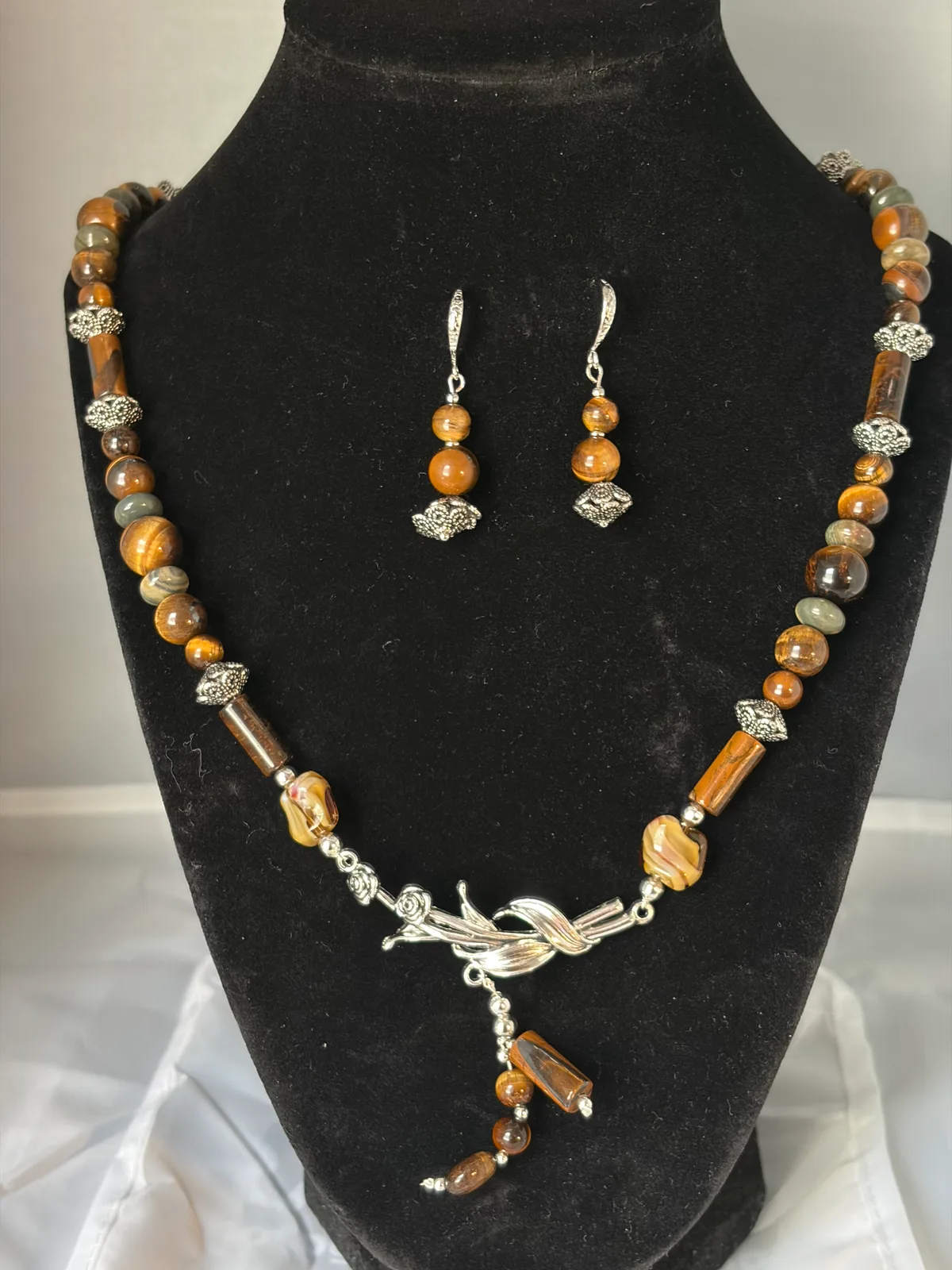 Neutral brown and silver beaded necklace and earring set handcrafted by Patty